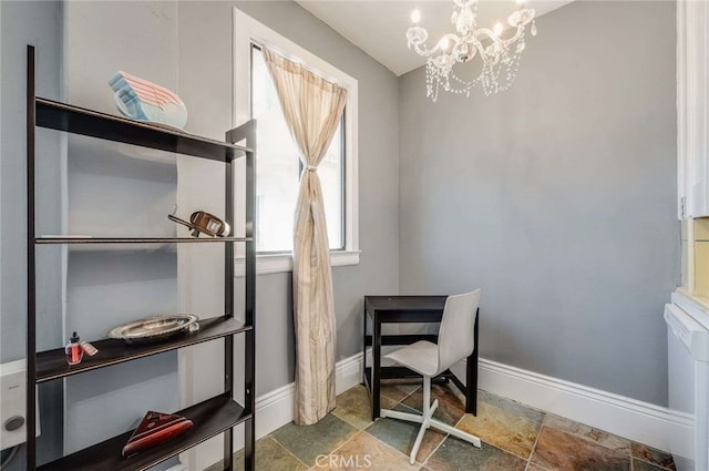 315 W 3rd St Unit 1003, Long Beach, CA 90802 - office featuring stone finish flooring, a chandelier, and baseboards
