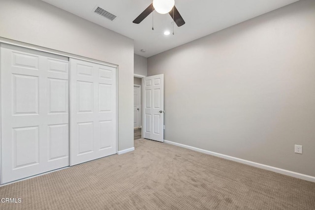 40719 E 171st St E, Lake Los Angeles, CA 93535 - unfurnished bedroom with light carpet, a closet, baseboards, a ceiling fan, and recessed lighting