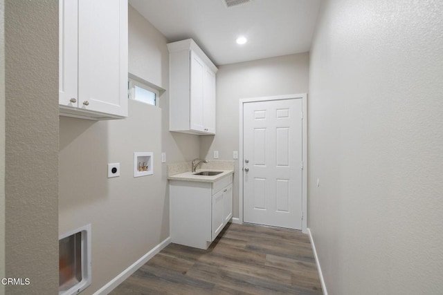 40719 E 171st St E, Lake Los Angeles, CA 93535 - laundry room with electric dryer hookup, hookup for a washing machine, cabinet space, baseboards, and dark wood finished floors