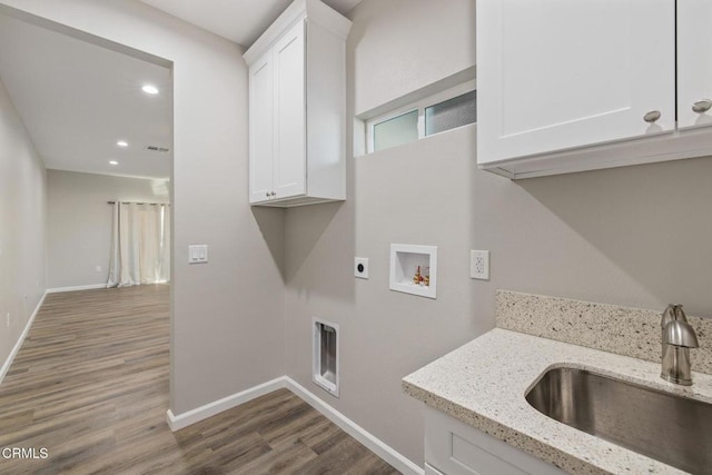 40719 E 171st St E, Lake Los Angeles, CA 93535 - clothes washing area featuring hookup for an electric dryer, wood finished floors, baseboards, cabinet space, and recessed lighting