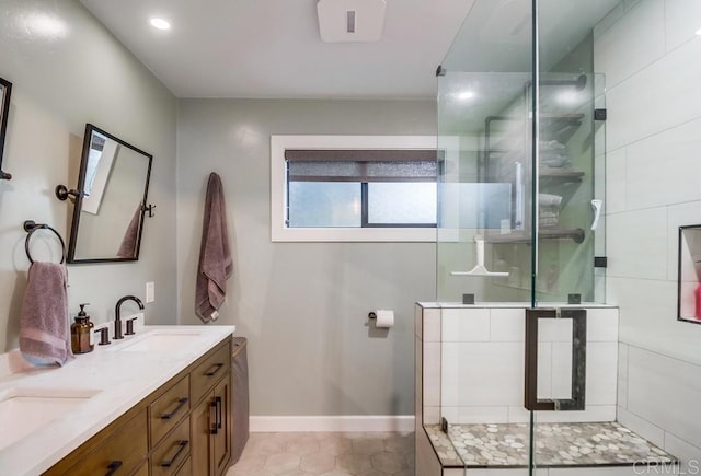 2444 Via Dieguenos, Alpine, CA 91901 - bathroom featuring a stall shower, double vanity, recessed lighting, baseboards, and tile patterned flooring