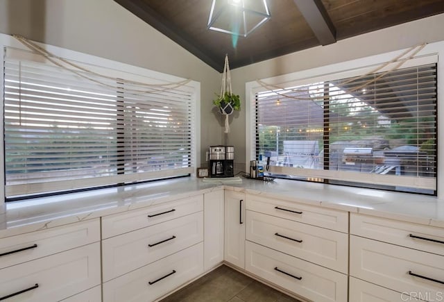 2444 Via Dieguenos, Alpine, CA 91901 - kitchen featuring lofted ceiling, light stone countertops, white cabinets, tile patterned flooring, and wooden ceiling