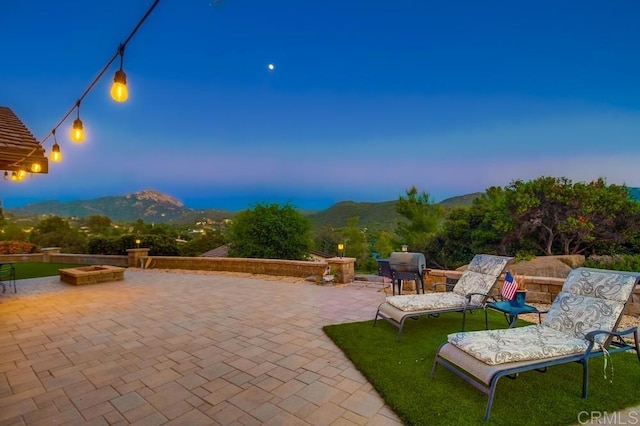 2444 Via Dieguenos, Alpine, CA 91901 - view of patio with an outdoor fire pit and a mountain view