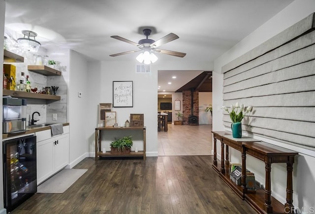 2444 Via Dieguenos, Alpine, CA 91901 - hallway featuring beverage cooler, a sink, dark wood-type flooring, and recessed lighting