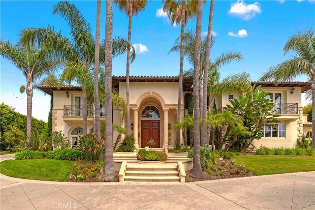 1502 Paseo La Cresta, Palos Verdes Estates, CA 90274 - mediterranean / spanish-style house with a balcony, stucco siding, and a front yard