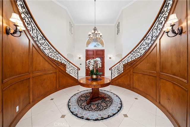 1502 Paseo La Cresta, Palos Verdes Estates, CA 90274 - foyer entrance featuring stairway, a chandelier, a decorative wall, crown molding, and light tile patterned floors