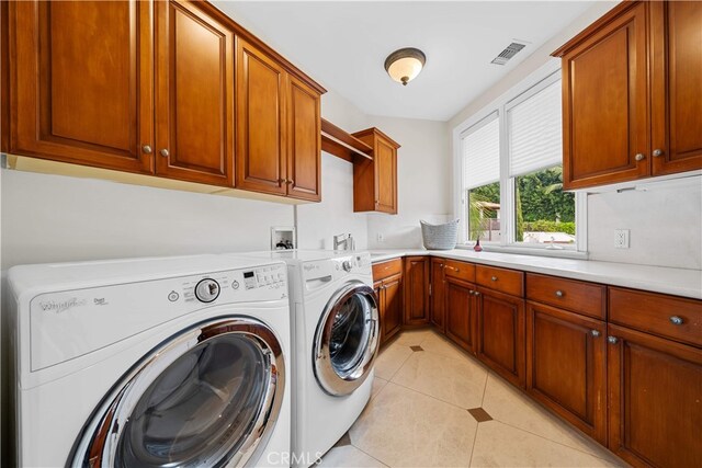1502 Paseo La Cresta, Palos Verdes Estates, CA 90274 - washroom featuring washer and clothes dryer, cabinet space, and light tile patterned floors