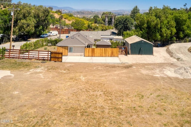 view from above of property with a mountainous background