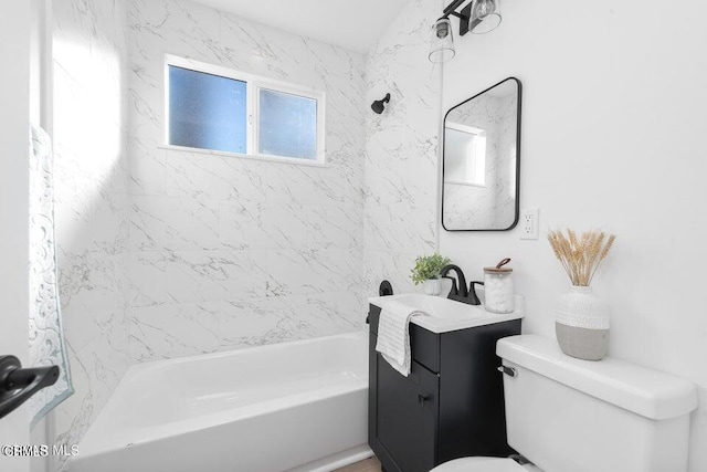 full bathroom featuring toilet, vanity, and shower / tub combination