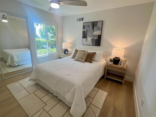 2041 Shadytree Ln, Encinitas, CA 92024 - bedroom with wood finished floors, baseboards, and a ceiling fan