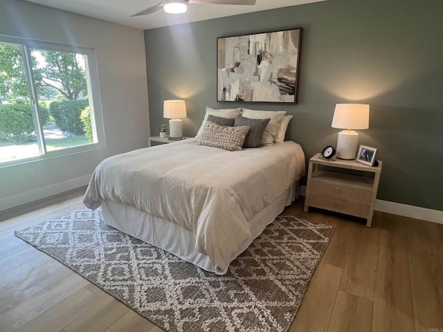 2041 Shadytree Ln, Encinitas, CA 92024 - bedroom featuring baseboards, wood finished floors, and a ceiling fan