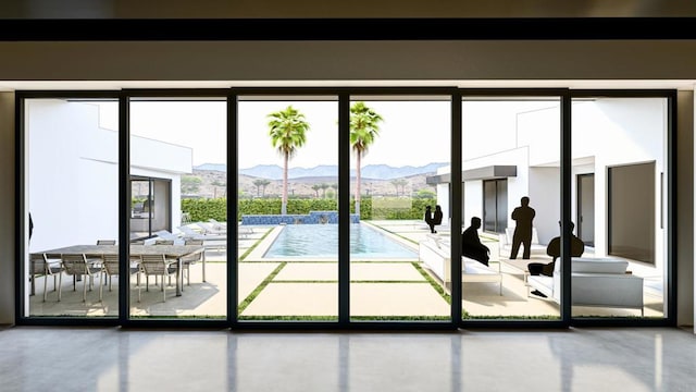 74171 Covered Wagon Trl, Palm Desert, CA 92260 - entryway with a mountain view and floor to ceiling windows