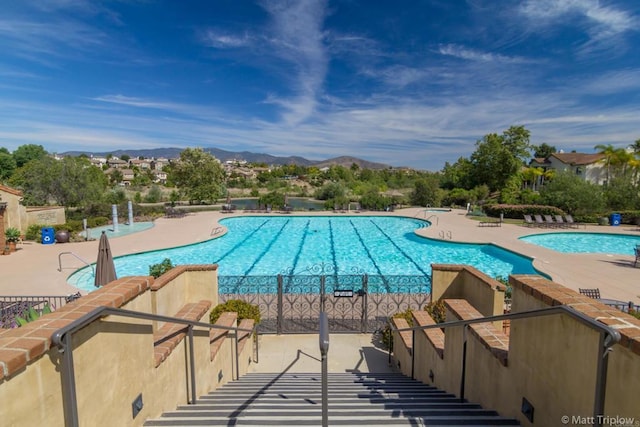 1109 Chimney Flats Ln, Chula Vista, CA 91915 - community pool with a mountain view and a patio