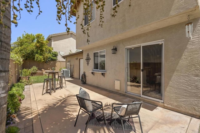 1109 Chimney Flats Ln, Chula Vista, CA 91915 - fenced backyard with central AC unit, a patio area, and outdoor dining space