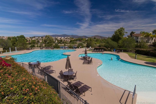 1109 Chimney Flats Ln, Chula Vista, CA 91915 - community pool featuring a mountain view and a patio