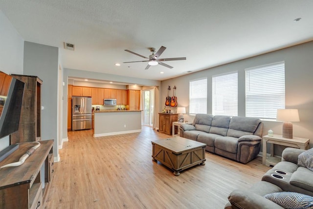178 Via Montisi, Santee, CA 92071 - living room with a ceiling fan, light wood-type flooring, baseboards, and recessed lighting
