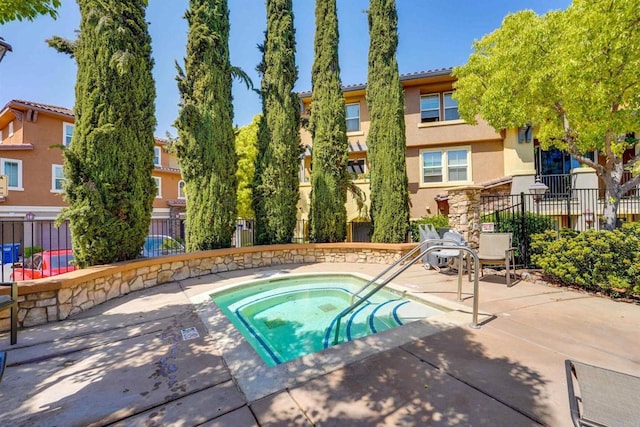 178 Via Montisi, Santee, CA 92071 - view of pool featuring a hot tub and fence