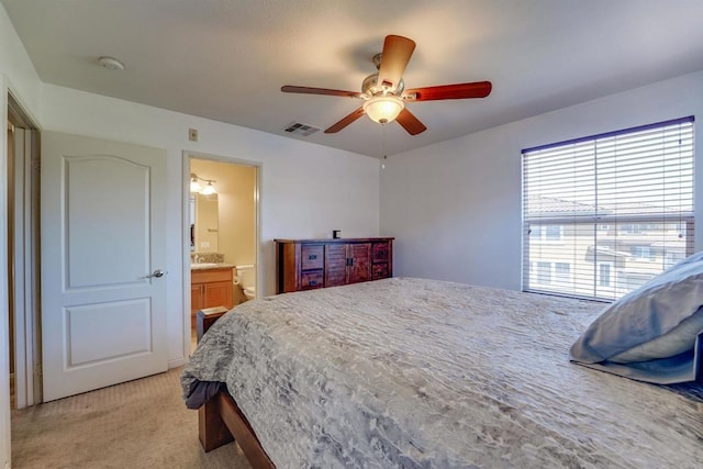 178 Via Montisi, Santee, CA 92071 - bedroom with light carpet, ensuite bath, and ceiling fan