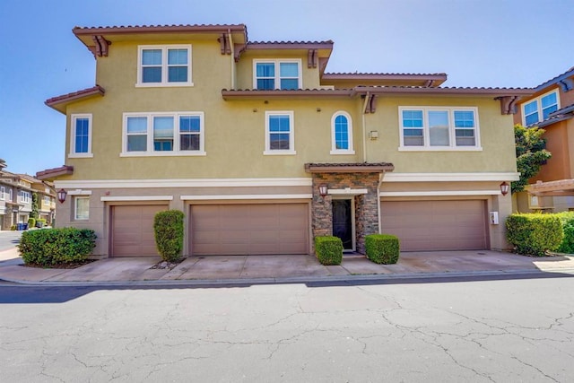178 Via Montisi, Santee, CA 92071 - view of front of home with stucco siding, a garage, a tile roof, and concrete driveway