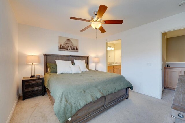 178 Via Montisi, Santee, CA 92071 - bedroom with light colored carpet, baseboards, and ensuite bath