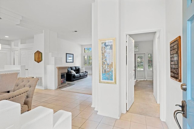 16054 Circa De Lindo, Rancho Santa Fe, CA 92091 - entrance foyer featuring light carpet, light tile patterned flooring, and plenty of natural light