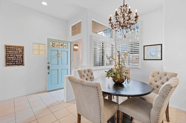 16054 Circa De Lindo, Rancho Santa Fe, CA 92091 - dining area featuring a chandelier, light tile patterned floors, baseboards, a high ceiling, and recessed lighting