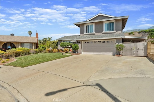 traditional-style home with an attached garage, stucco siding, and driveway