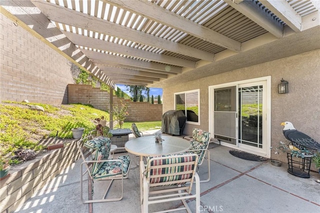 view of patio / terrace featuring fence and a pergola