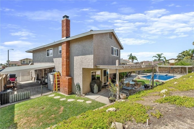 rear view of house with a patio, fence, a pergola, a chimney, and stucco siding
