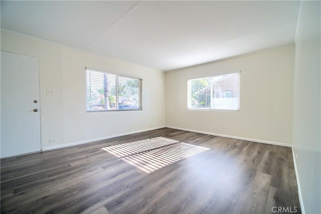 214 E Marshall Blvd, San Bernardino, CA 92404 - unfurnished room featuring plenty of natural light and wood finished floors