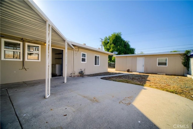 214 E Marshall Blvd, San Bernardino, CA 92404 - view of patio with an outbuilding