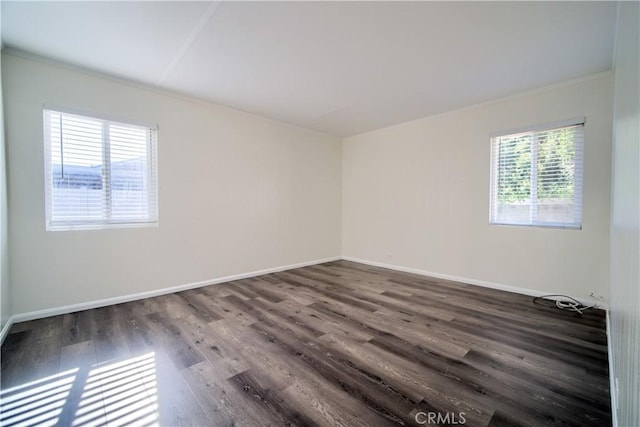214 E Marshall Blvd, San Bernardino, CA 92404 - empty room featuring crown molding and dark wood finished floors