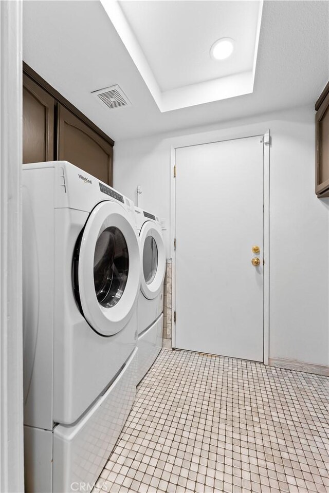 1467 W Southgate Ave, Fullerton, CA 92833 - washroom featuring cabinet space, washer and clothes dryer, tile patterned flooring, and recessed lighting