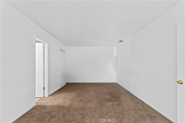 1467 W Southgate Ave, Fullerton, CA 92833 - empty room with carpet floors and baseboards