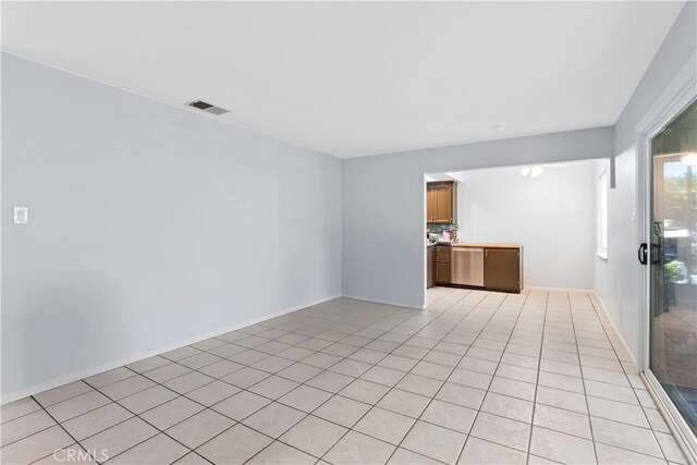 1467 W Southgate Ave, Fullerton, CA 92833 - unfurnished room featuring light tile patterned floors and baseboards