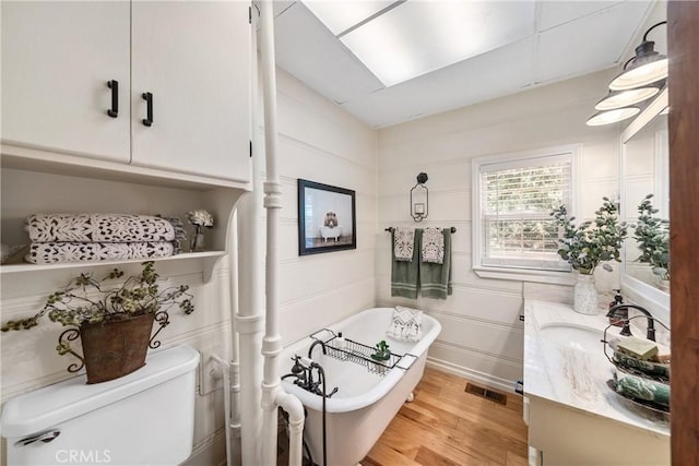 795 Glen View Ln, Twin Peaks, CA 92391 - bathroom with toilet, wood finished floors, a freestanding tub, and vanity