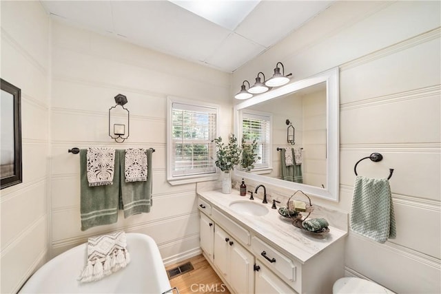 795 Glen View Ln, Twin Peaks, CA 92391 - full bathroom with vanity, wood finished floors, a shower, and a tub to relax in