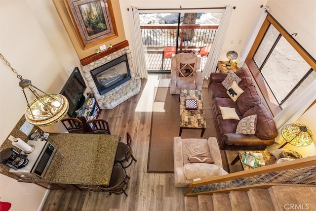 7540 Henness Cir Unit B206, Yosemite, CA 95389 - living area with wood finished floors and a fireplace