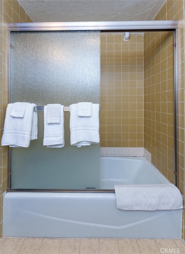 7540 Henness Cir Unit B206, Yosemite, CA 95389 - full bath with tile patterned floors and combined bath / shower with glass door