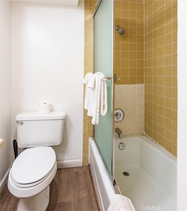 7540 Henness Cir Unit B206, Yosemite, CA 95389 - full bath with wood finished floors, baseboards, shower / bath combination with glass door, and toilet