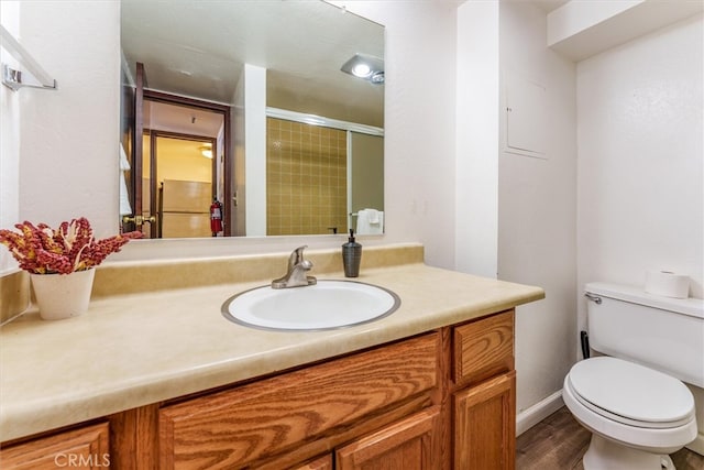 7540 Henness Cir Unit B206, Yosemite, CA 95389 - full bath with toilet, vanity, a stall shower, and wood finished floors