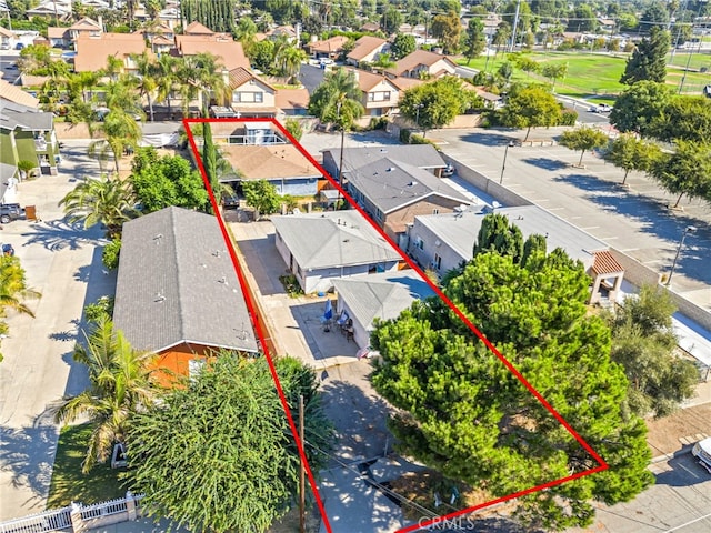 1335 W 11th St, Pomona, CA 91766 - aerial view of residential area with property parcel outlined