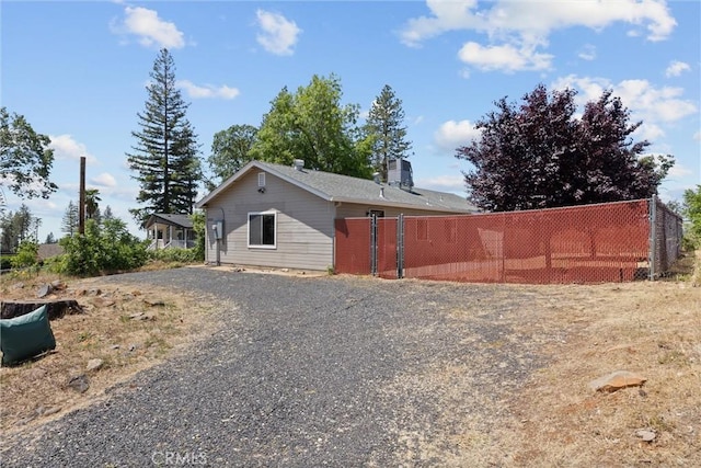 6383 Harvey Rd, Paradise, CA 95969 - view of side of home featuring gravel driveway