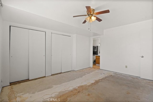 6383 Harvey Rd, Paradise, CA 95969 - unfurnished bedroom with multiple closets and a ceiling fan