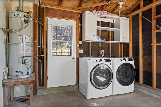 6383 Harvey Rd, Paradise, CA 95969 - laundry room featuring secured water heater, cabinet space, and washer and dryer
