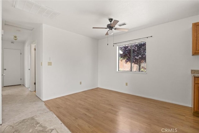 6383 Harvey Rd, Paradise, CA 95969 - unfurnished living room with ceiling fan, light wood-style flooring, and baseboards