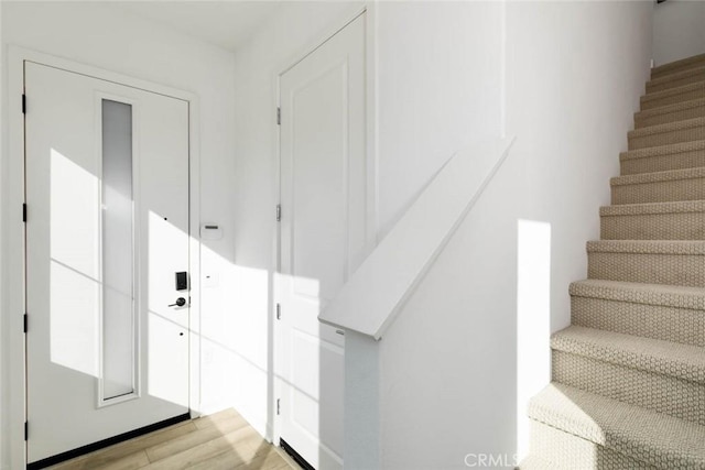 73 Culture, Irvine, CA 92618 - staircase featuring wood finished floors