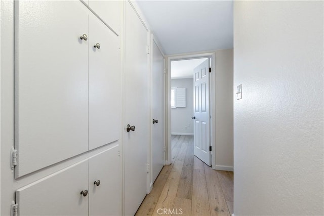 622 S Halcyon Rd, Arroyo Grande, CA 93420 - hall featuring light wood-style flooring and baseboards