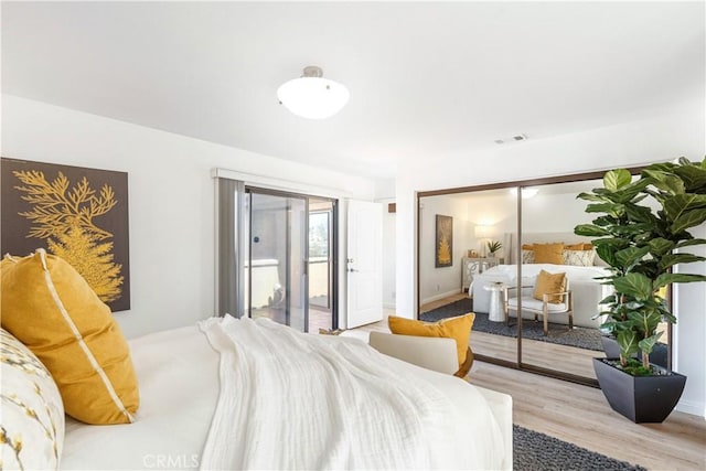 4286 W 182nd St Unit A, Torrance, CA 90504 - bedroom featuring access to exterior and light wood-style flooring
