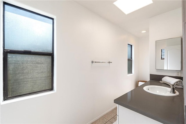 4286 W 182nd St Unit A, Torrance, CA 90504 - bathroom featuring tile patterned flooring, vanity, baseboards, and recessed lighting
